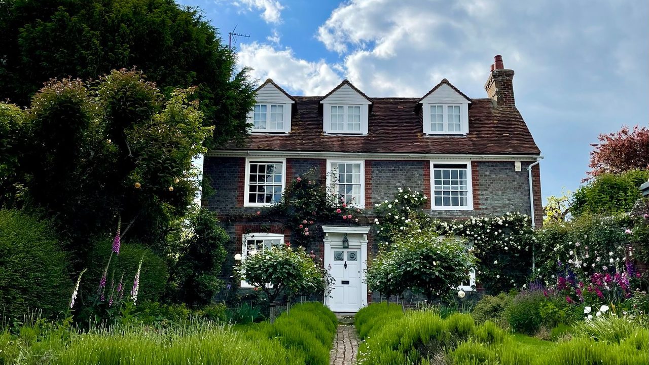 Ashcombe House, a Georgian manor care home in Knutsford, seen across its lawns