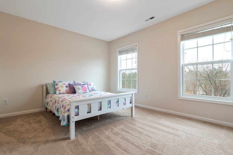 A furnished bedroom at Ashcombe House